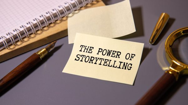 The,Power,Of,Storytelling,Inscription,In,A,White,Notebook,On
